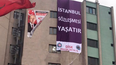 MHP binasına "İstanbul Sözleşmesi Yaşatır" afişi asıldı