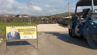 Hatay’da olumsuz havaya rağmen asfaltlamaya devam