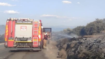 İzmir İtfaiyesi Dikili’de orman yangınına müdahale ediyor