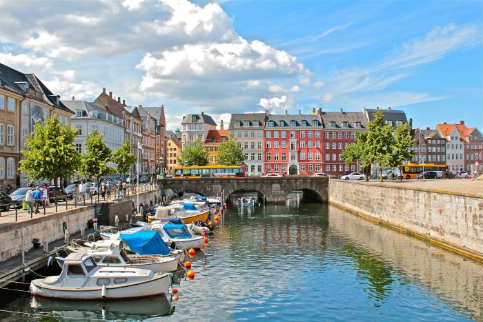 861811-Denmark-Copenhagen-Houses-Motorboat-Canal.jpg