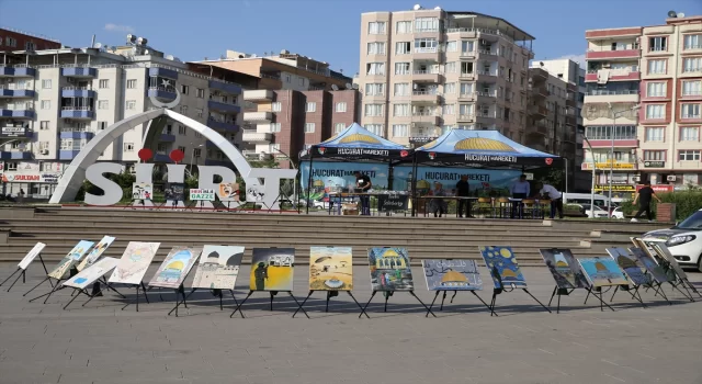 Baba ile kızı, İsrail’in Gazze’deki saldırılarını anlatan resimleriyle Siirt’te sergi açtı