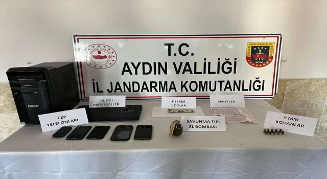 Aydın’da FETÖ şüphelisinin otomobilinde el bombası ve F serisi 1 dolar bulundu