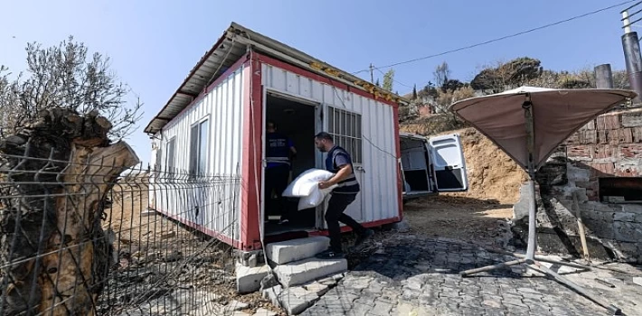 Yangınların ardından İzmir’in yaraları sarılıyor  Büyükşehir’den 71 haneye 3 buçuk milyon TL’yi aşan destek